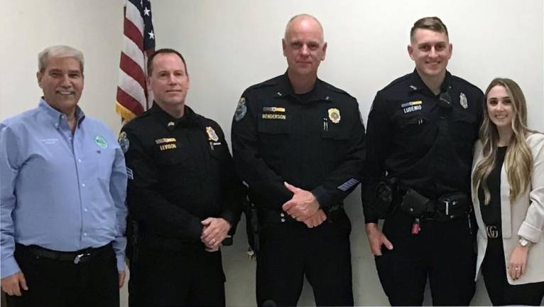 At the Tuesday evening’s Village of Harriman Board meeting, Officer Andrew Ludewig was unanimously promoted to the rank of sergeant. Before joining the Village of Harriman in 2019, Ludewig worked for the State Police as a detective. Pictured from left to right are Harriman Mayor Lou Medina, Sgt. John Levison, Chief Daniel Henderson, Sgt. Ludewig and fiancé Gabby Minieri. Provided by Village of Harriman.
