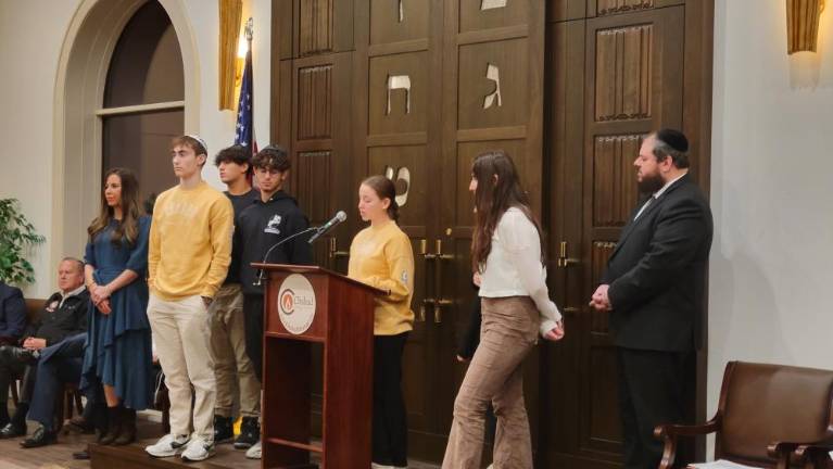 A member of Chabad Teen addresses the rally.