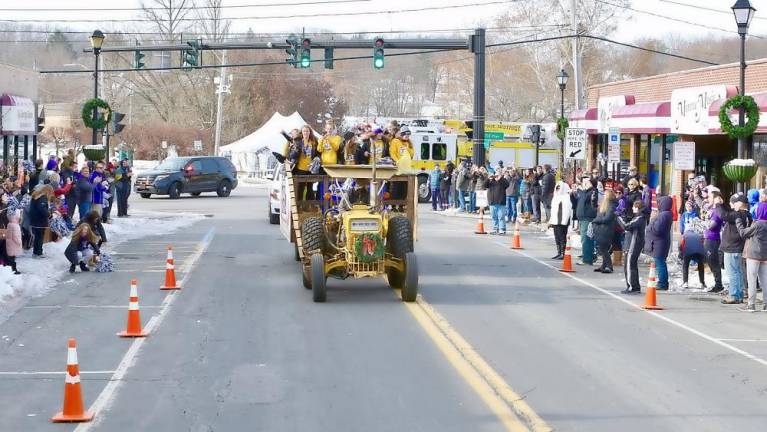 The Championship Parade comes down Lake Street in downtown Monroe.