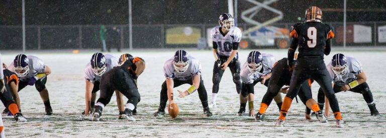 Photos by Don Beeler Quarterback Keven Carr and the Monroe-Woodbury offensive line.