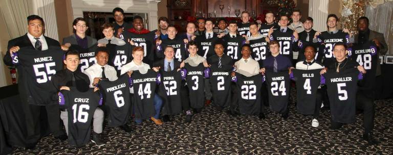 The Crusader seniors pose for one last team photograph together.