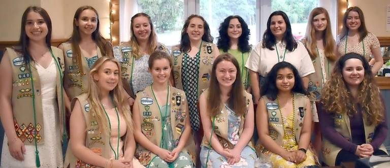 These Ambassador Girl Scouts are among the 21 young women who are now graduates of the national and local Girl Scout program.