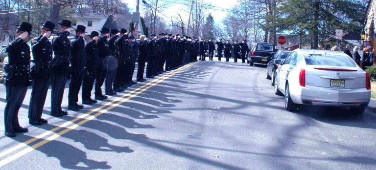 Twelve police departments, the Orange County Sheriff's Office and the New York State Police attended the funeral March 2 of former Greenwood Lake Police Chief Robert Rabbitt Jr.