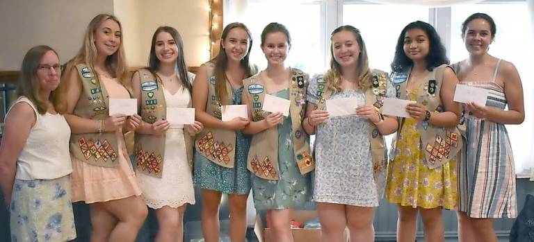 Barbara Mallory, with Nora Jean Fields Scholarship recipients: Madelyn Bascardi, left, Carleigh Newman, Isabel Woods, Meghan Jezik, Gabrielle Schnaars, Chole Saldanha and Sarah Schiller, who attended on behalf of sister Molly Schiller.
