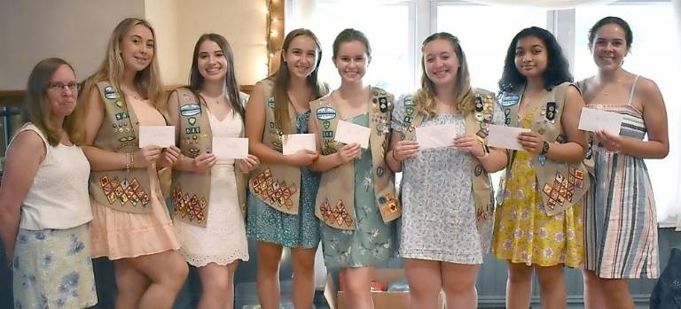 Barbara Mallory, with Nora Jean Fields Scholarship recipients: Madelyn Bascardi, left, Carleigh Newman, Isabel Woods, Meghan Jezik, Gabrielle Schnaars, Chole Saldanha and Sarah Schiller, who attended on behalf of sister Molly Schiller.