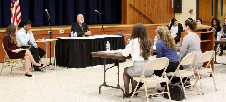 The Mock Trial team of students from Monroe-Woodbury High School eliminated the team from Marlboro High School.