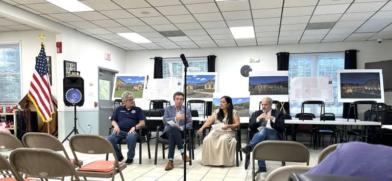 Woodbury Town Supervisor Jacqueline Hernandez (center) outlined the town’s next steps regarding transportation services at the June 29 joint Town and Village Hall meeting.