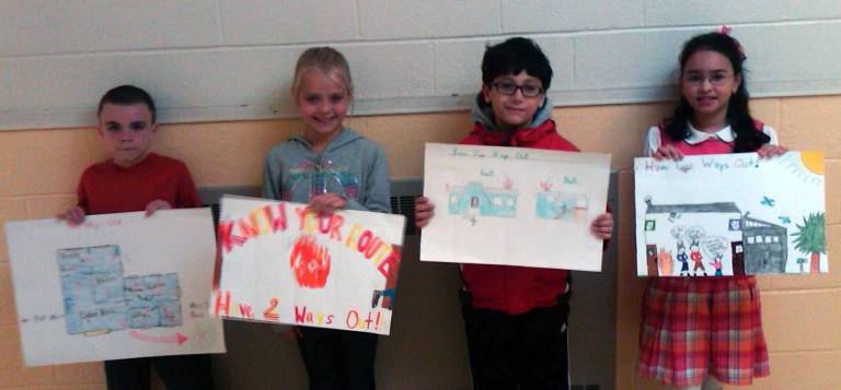 Pine Tree Elementary first place winners: Second-grader Liam Gallagher, third-grader Kelsey O'Brien, fourth-grader Thomas Fernandez and fifth-grader Sophia Kohlbecker