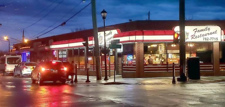 The Millpond Parkway in Monroe was dark and quiet on Friday night, with the exception of a some walkers getting some early evening exercise and people picking up takeout orders at places like Planet Pizza.