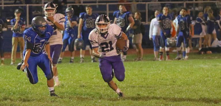 Crusader Peter Mastropolo (#21) scored on this 24-yard run in the fourth quarter.