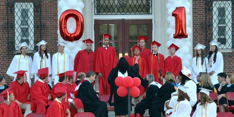 The High School Chorus sang a beautiful rendition of Paul Simon's "Bridge Over Troubled Water."