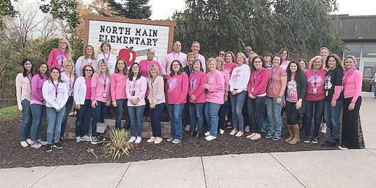 This photo is a representation of North Main Elementary and its staff's support for cancer awareness. North Main Elementary teacher and a breast cancer survivor Michelle PereiraI led the district's fund-raising efforts for the American Cancer Society's Making Strides Against Breast Cancer Walk held Oct. 20 at Woodbury Common Premium Outlets. Our entire staff has always been very generous, not only in their monetary contributions, but in offering their never-ending support and encouragement to those affected by this disease, Pereira wrote in submitting the photo. This year proved no different.