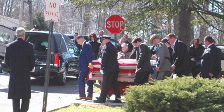 Photos by Ed Bailey One of the largest turnouts from police departments paid tribute to former Greenwood Lake Police Chief Robert &quot;Bobby&quot; Rabbitt Jr. at his funeral last Thursday, March 2, at Holy Rosary Church in Greenwood Lake.
