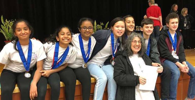 Team McInerney of Monroe-Woodbury Middle School: Anushree Buragohain, Jamie Calub, Colin Davidson, James Dawson, Khushi Girish, Shreya Girish and Isabelle Varghese with coach Joanne McInerney.
