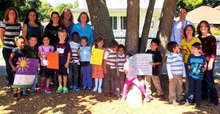 Presenting cards to the PTA are Summer Arroyo, left, Luke Skarkas, Christie McNeill, Lucas Beers, Brandon Burch, Riley Smyth, Tea Proia, Daniel Gonzales, David Gonzales, Violette Kline, Ethan Torres, Nicholas Ishak, and Aidan O&#xfe;&#xc4;&#xf4;Hare. Back row: Jenn Swajger, Liz Yunque, Angela Traina, Sandra Van Beusekom, Smith Clove Principal Debra Turnquist, Assistant Principal Christopher Berger, Tammy Sabat and Rachel Landres.