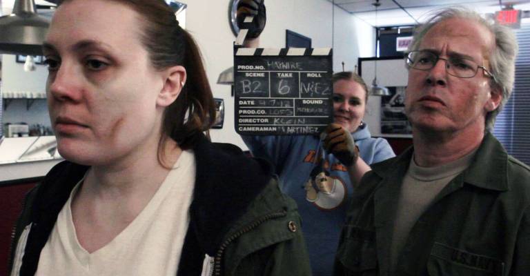 Provited photo Actor Rebecca Nyahay, left, grip Dee Wassel and actor Ken Sharp are ready for shooting to begin.