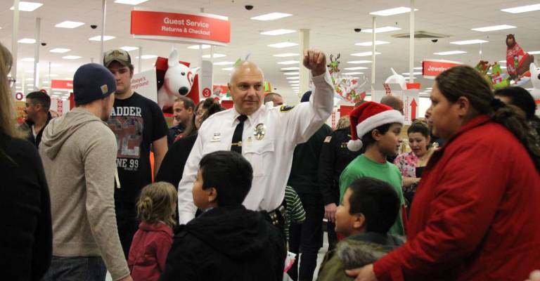 Photos by Linda Mastrogiacomo Woodbury Police Lt. Arthur counts down: On your mark, get set, shop!
