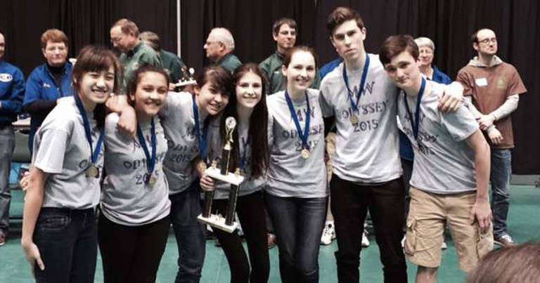 With their first place trophy are the members of the Monroe-Woodbury High School team, from the left: Katrina Paredes, Ishita Krishan, Natalie Davidson, Heather Rutishauser, Nancy Rutishauser, Jordan Glass and Nick Sullivan.