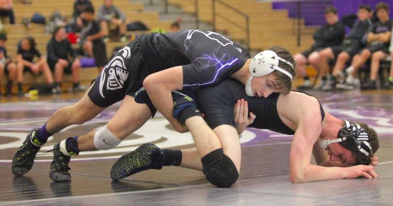 Marco Vespa (126 lbs.) controls his opponent before recording a pin.