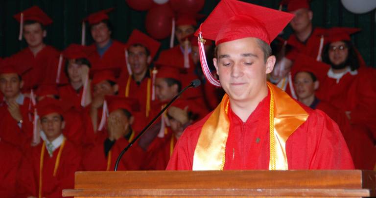 Valedictorian Andrew Ehlers addresses the Class of 2012 during graduation ceremonies last Friday. He will attend RPI in Troy in the fall.