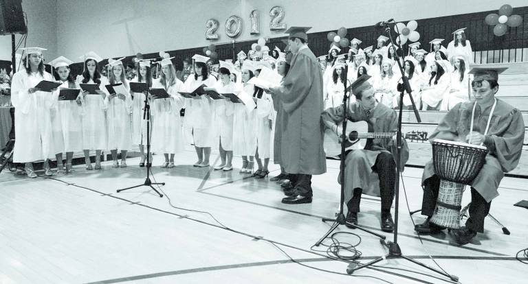 Photo by Ed Bailey The concert choir at George F. Baker High School in Tuxedo performs &quot;Send Me on My Way&quot; in an arrangement by Rusted Root.