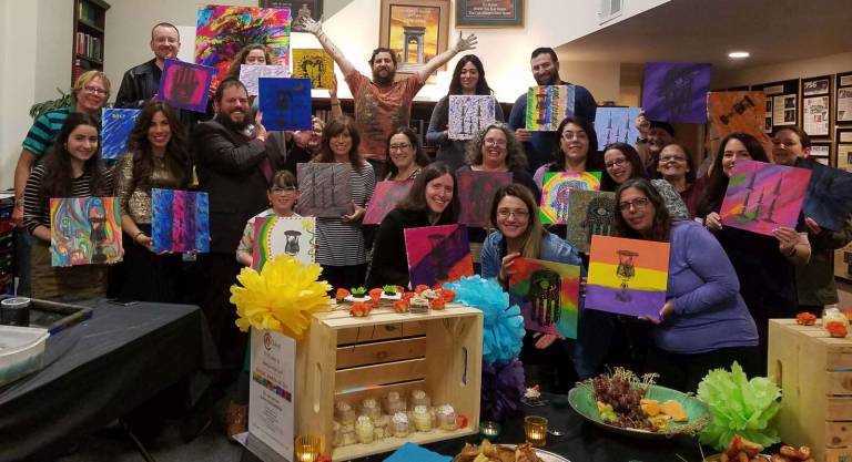 A few of the creative paintings that were made at the Jewish Pop Art event.