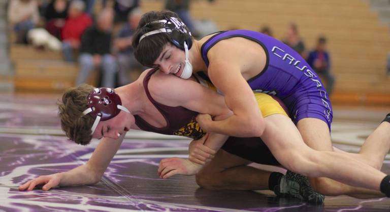 Jake Minnies (120 lbs.) controls his Tiger opponent before pinning him at 5:11 in the match.