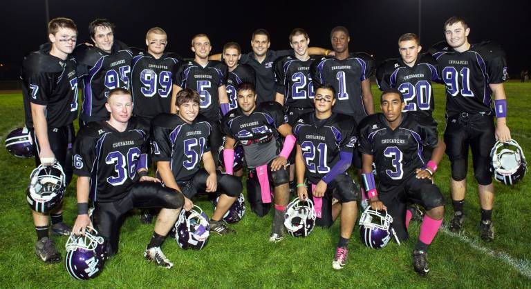 The Monroe-Woodbury defense, who are coached by defensive coordinator Michael Connelly, son of head Coach Bernie Connelly. In winning its first six games this year, the defense has allowed less than 12 points per game, sacked quarterbacks 11 times, intercepted five passes and recovered another five fumbles. As a team, the Crusaders have accumulated 353 tackles.