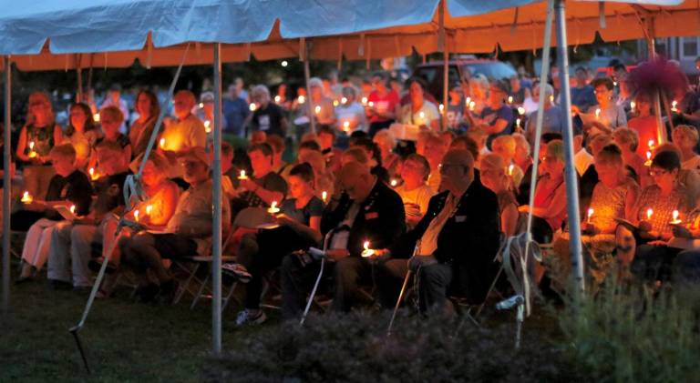 The ceremony ended in candle light.