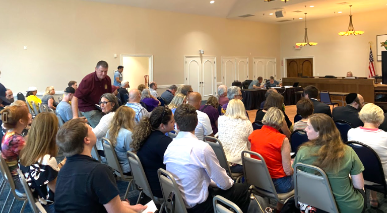 Crowd gathered at the July 13 Monroe Town Board meeting, which included a public hearing on the Seven Springs Road Realignment project.