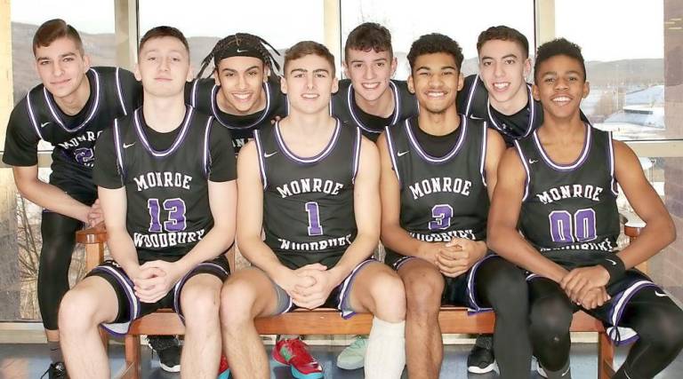 From left to right, members of the Monroe-Woodbury Varsity Boys Basketball team are: Jordan Schoen, Jack Harris, Pablo Quinones, Will Fuchs, Dan Quinones, Josh Castro, Paul Bochterie and Sean Morris.
