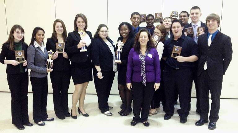 Eighteen members of Monroe-Woodbury High Schoolís chapter of the Future Business Leaders of America tested their business knowledge during the annual FBLA district meeting in Arlington High School at the beginning of the month. And they accorded themselves quite well.