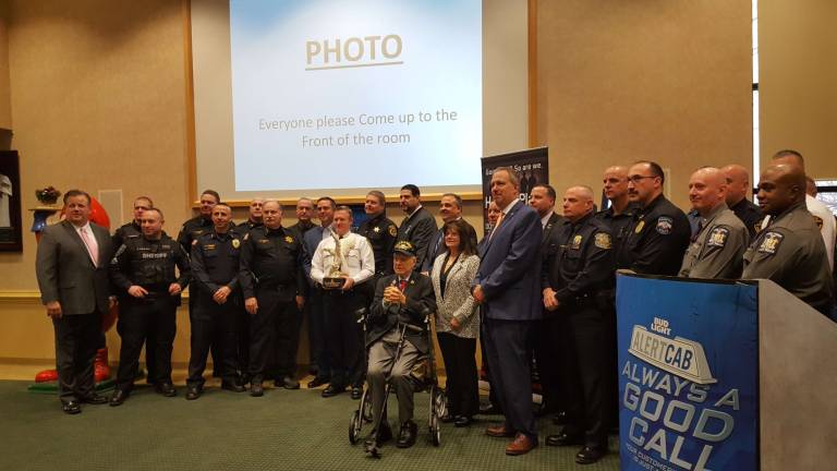 Law enforcement officers join the Alert Cab launch on Dec. 28 (Photo provided)