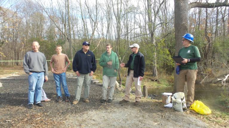 All Bruderhof Belleville Community members received awards for their help and assistance during the project (from left): Arno Wright, Bruderhof Bellevale Community; Arno&#x2019;s son, Wilfred Wright, Bruderhof Bellevale Community; John Burleson, Bruderhof; Colin Wright, Bruderhof; Bob Fuller, crew leade (Photo by Frances Ruth Harris)