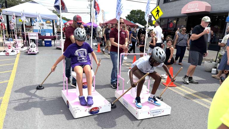 More than 100 participants competed in Nebrasky’s Toilet Bowl Races at the Monroe Cheese Festival.
