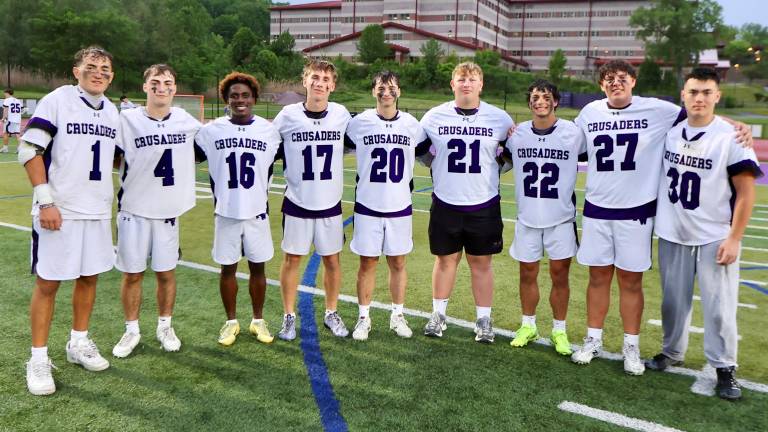 The seniors on this year’s team were honored in a brief ceremony after the game. (L-R) Gavin Fitzgibbon, Michael Luongo, Tyler Tenemille, Liam Williamson, Joey Buchanan, Ashton Capen, Anthony Severo, Jose Hernandez and Chadwick Kistler.