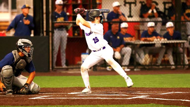 Crusader Catcher Joey Bauer at bat.