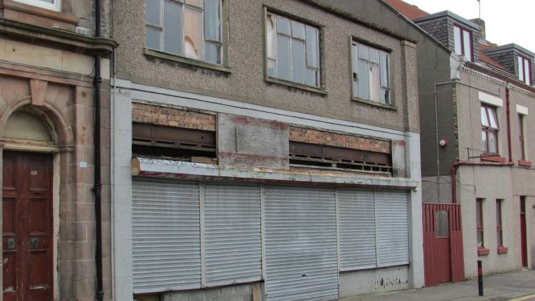 On April 14, the Town of Woodbury authorized Town Supervisor Jacqueline Hernandez to sign opposing the REVIVE Act, which aims to fast-track the conversion of vacant commercial buildings into high-density housing.