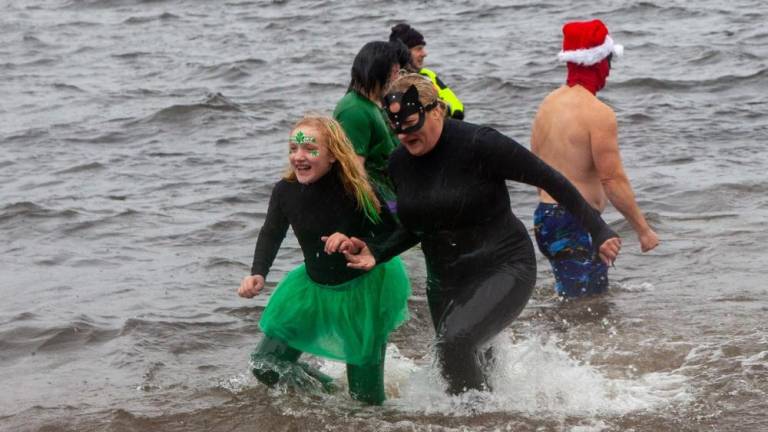Scenes from last year’s Special Olympics Polar Plunge in Greenwood Lake.