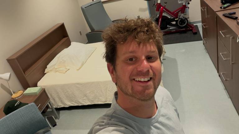Monroe native Jake Rosmarin is all smiles at the National Quarantine Unit in Nebraska.