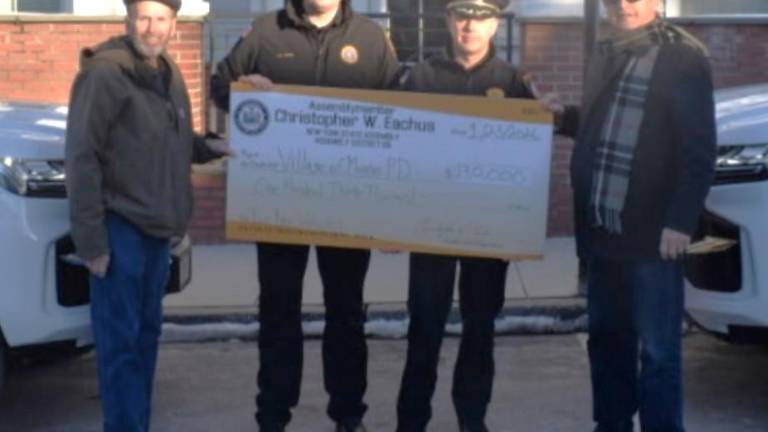 From left: Village of Mayor Neil Dwyer, Lt. Timothy Young, Chief Darwin Guzman and NYS Assemblyman Chris Eachus.