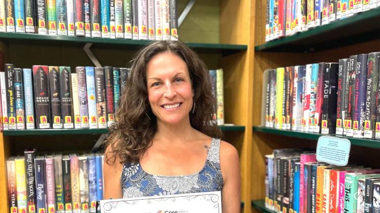 Elizabeth Walraven earned the ALA 2026 PR Xchange Award for her promotional work on Monroe Free Library’s 1970s Disco Party.