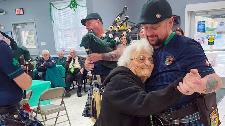 “This is our wonderful Senior Lily,” Woodbury Supervisor Kate Luciani said. “She was dancing with her walker with the Shields band when the one member put down his drum to dance with her. Was a moment that everyone in the room felt in their hearts.”