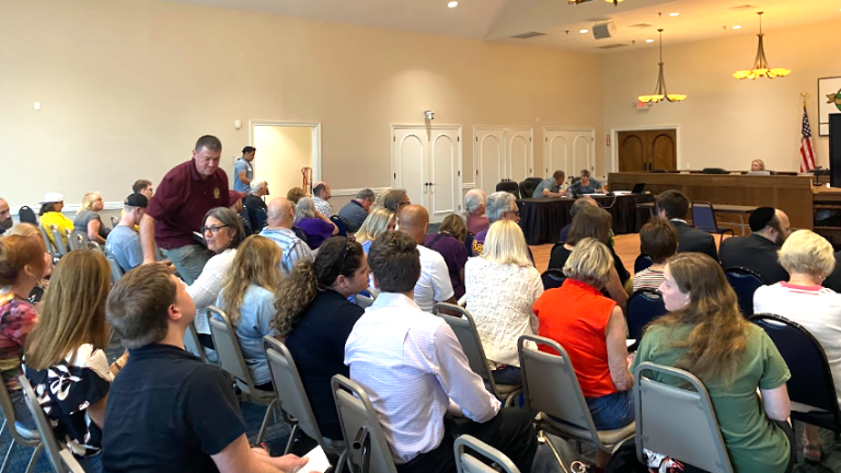 Crowd gathered at the July 13 Monroe Town Board meeting, which included a public hearing on the Seven Springs Road Realignment project.
