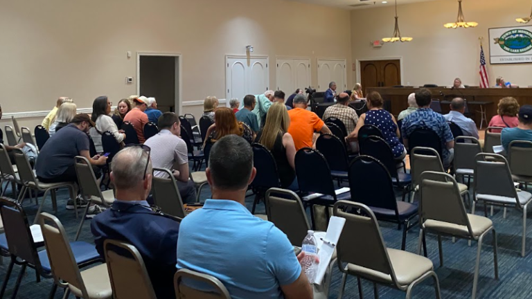 Crowd gathered at the June 8 Monroe Town Board meeting where the canceled food truck festival and other matters were discussed.