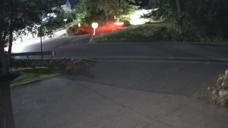 A screenshot of surveillance video shows a car crashing into a house in Monroe in the early mornings hours of July 26.